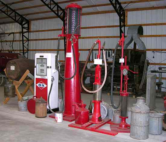 Antique  gasoline pumps and fuel cans at Ag Heritage Park