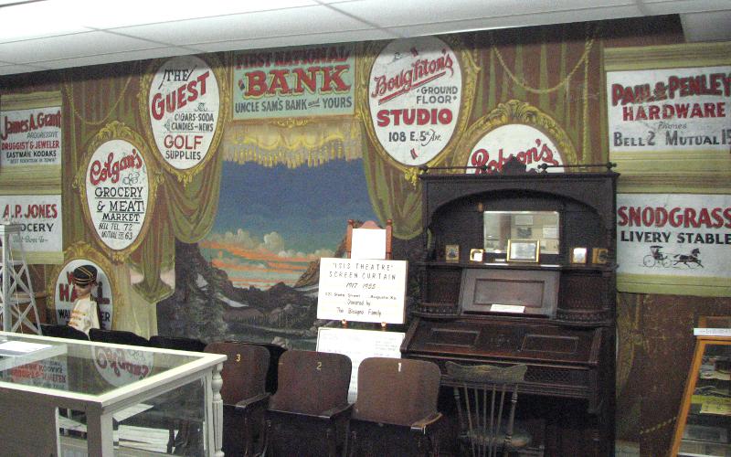 Isis Theater advertising curtain in Augusta, Kansas
