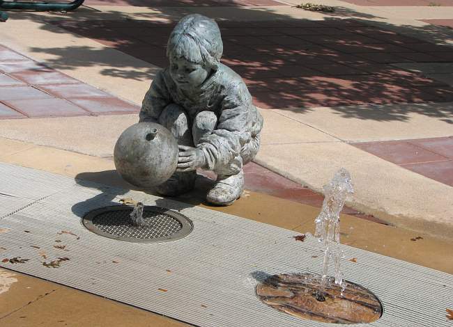 Georgia Gerber bronze sculpture and fountain along Douglas Avenue in Wichita