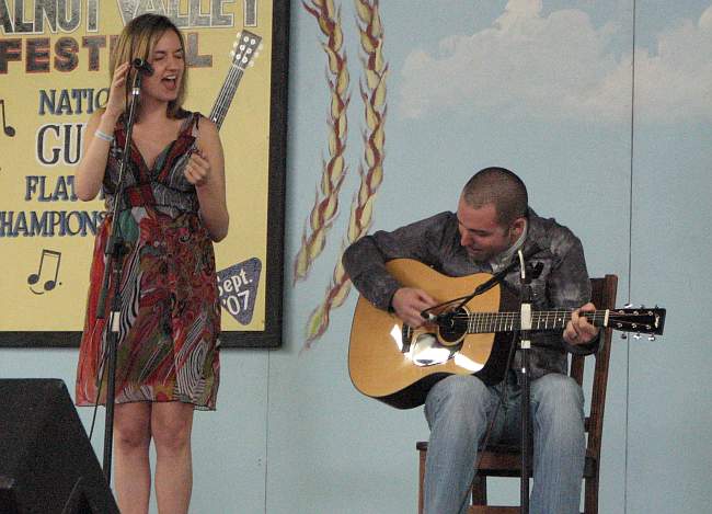 Beth Miner and Carl Miner on stage in Winfield, Kansas