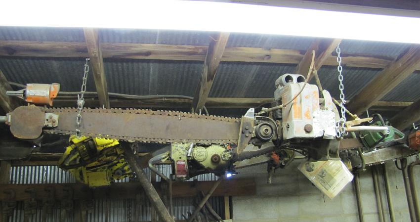 Disston chain saw with Mercury gasoline engine