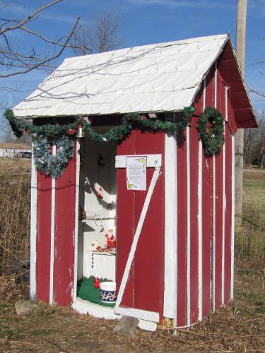 Christmas themed outhouse