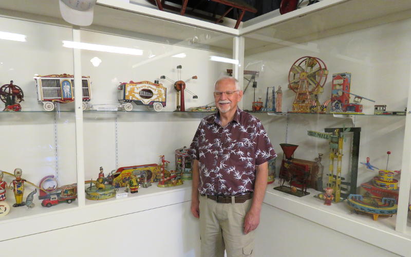 Ralph Vogel with antique circus toys
