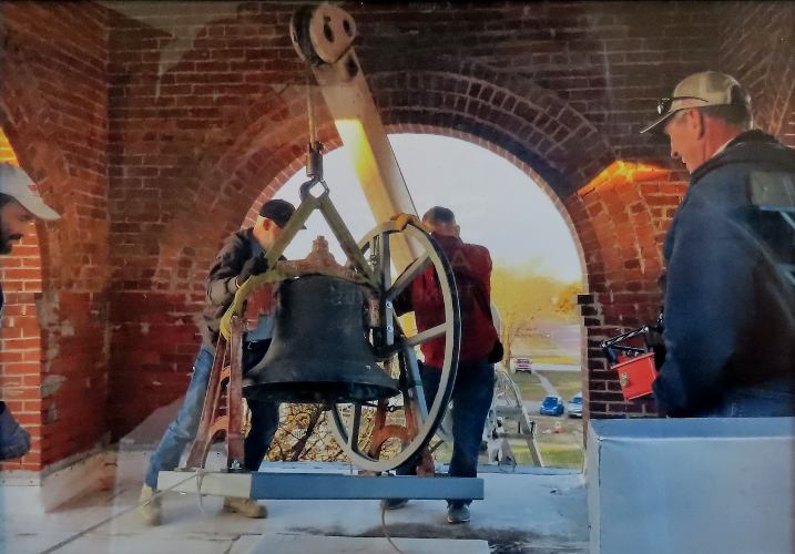 Installing the bell in the church bell tower