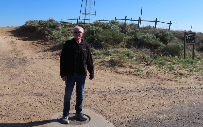 standing on the Tristate Marker