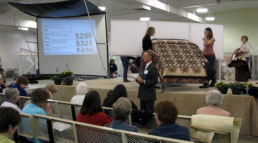 Quilt Auction at the Kansas Mennonite Relief Sale in Hutchinson, Kansas