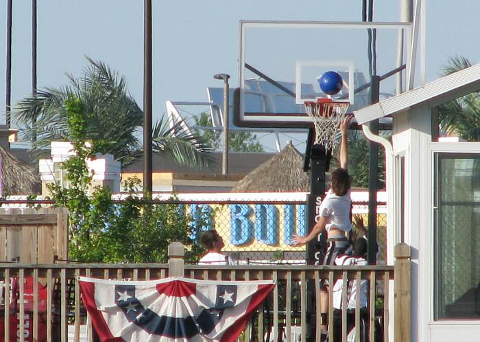 Kids playing basketball at Community Amrica Stadium